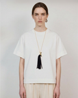SPIRIT GOLD-PLATED PENDANT WITH BLACK LEATHER-FRINGED TAIL