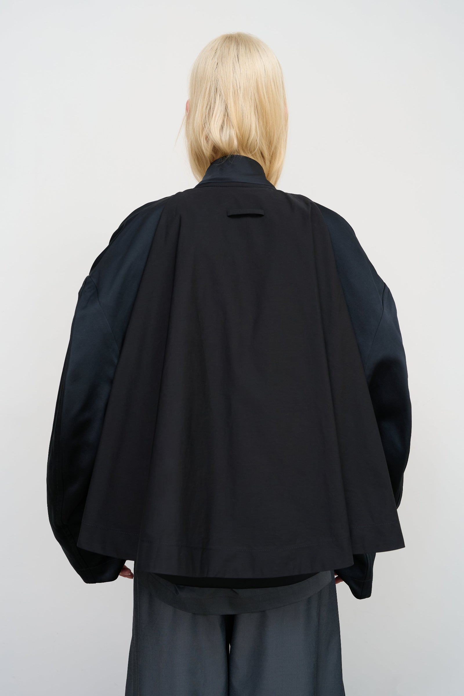 BLACK CAPE OVERLAY BOMBER JACKET