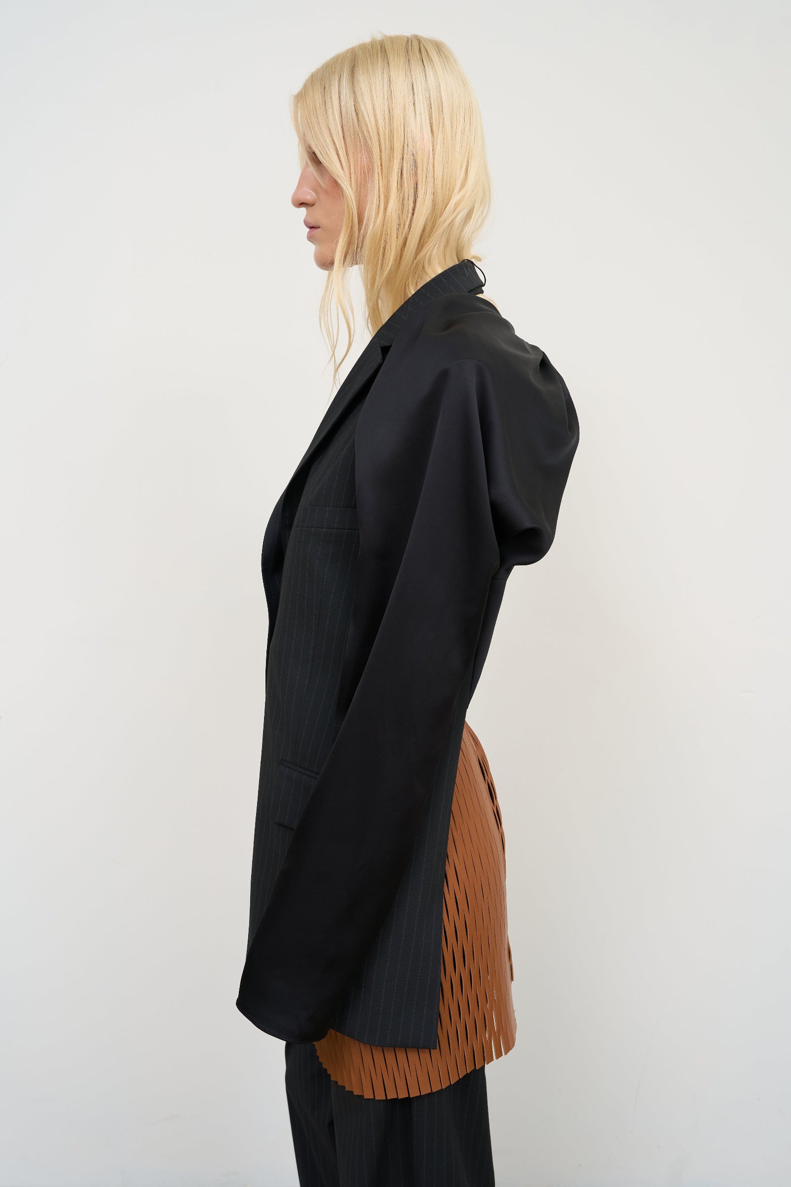 FITTED VEST WITH TWISTABLE SLEEVE DETAIL