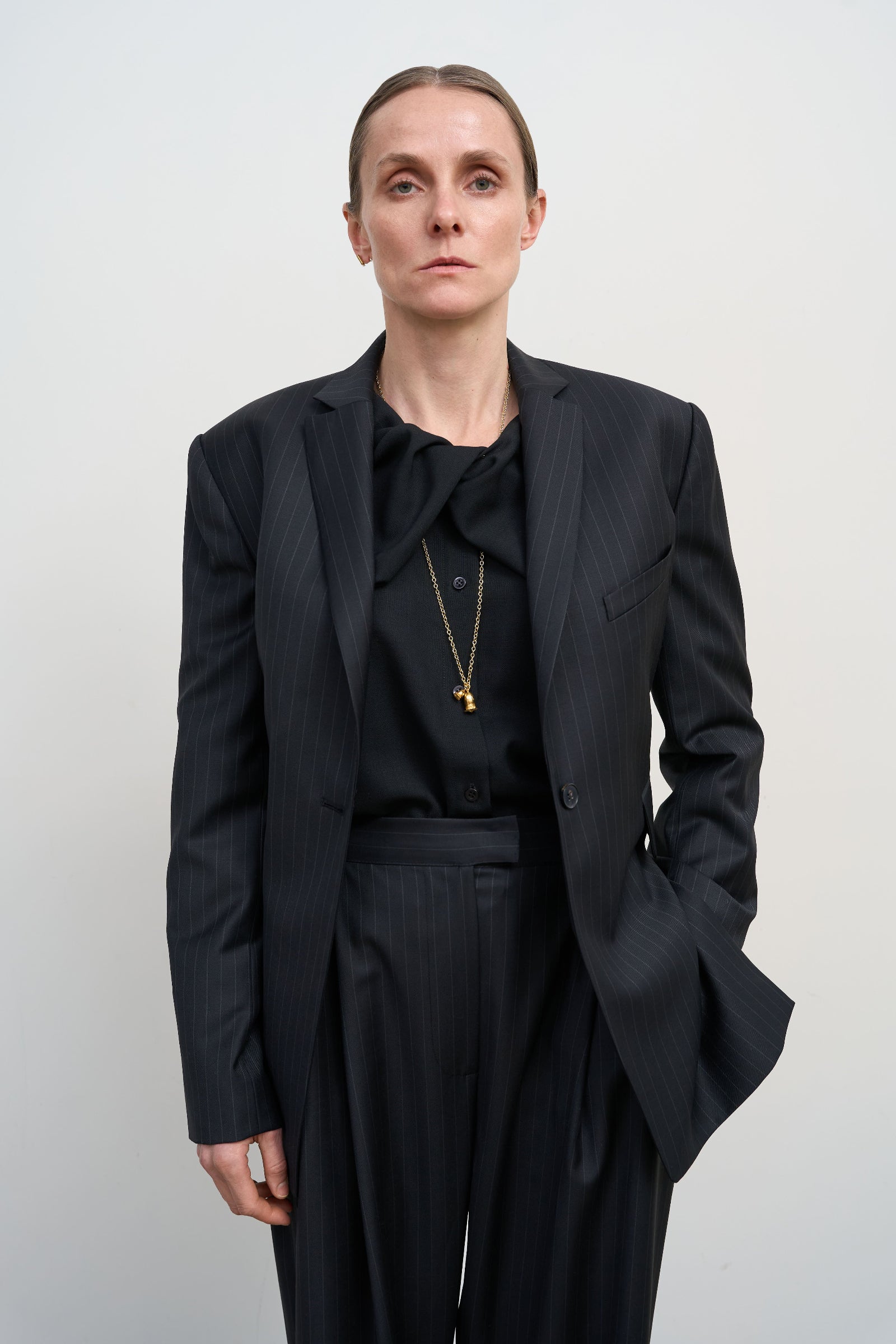 FITTED JACKET WITH TWISTED BACK DETAIL