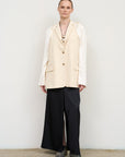 IVORY FITTED VEST WITH TWISTABLE SLEEVE DETAIL
