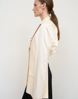 IVORY FITTED VEST WITH TWISTABLE SLEEVE DETAIL 1