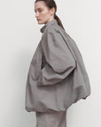VOLUMINOUS BOMBER WITH DRAWSTRING