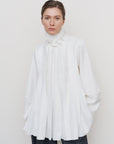 PEPLUM-PLEAT BLOUSE