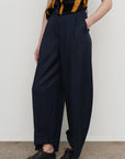 PLEATED BARREL-LEG PANTS