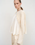 Loose-Fitted Beige Blouse with Structured Jacket Sleeves 2