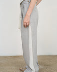 PANTS WITH FRAYED-EDGE SIDE STRIPES