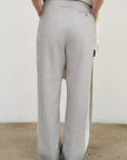 PANTS WITH FRAYED-EDGE SIDE STRIPES