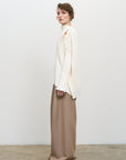 PLISSÉ BLOUSE WITH SLOUCHY SHOULDER LINE ivory 1