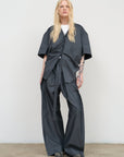 VISCOSE BLEND BLOUSE WITH A TWISTED BACK