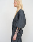VISCOSE BLEND BLOUSE WITH A TWISTED BACK