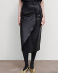 ASYMMETRIC LEATHER MIDI SKIRT