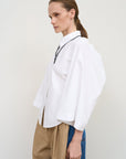 FITTED SHIRT WITH TWISTABLE SLEEVE DETAIL