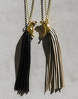 SPIRIT GOLD-PLATED PENDANT WITH BLACK LEATHER-FRINGED TAIL