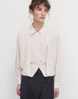 LAYERED BLOUSE WITH TUCKED HEM