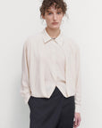 LAYERED BLOUSE WITH TUCKED HEM
