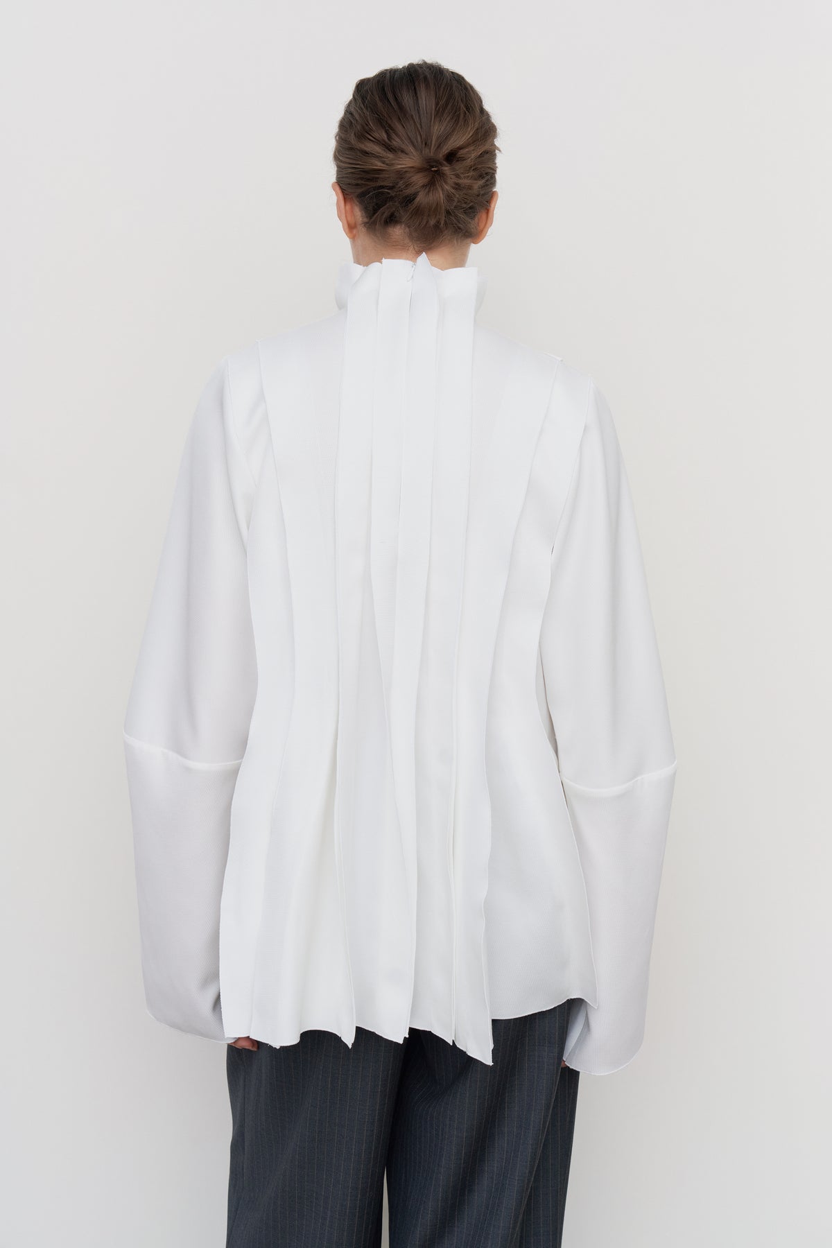 PEPLUM-PLEAT BLOUSE