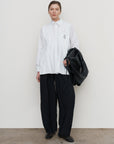 RUFFLE HIGH-RISE BIFLEX BARREL-LEG PANTS