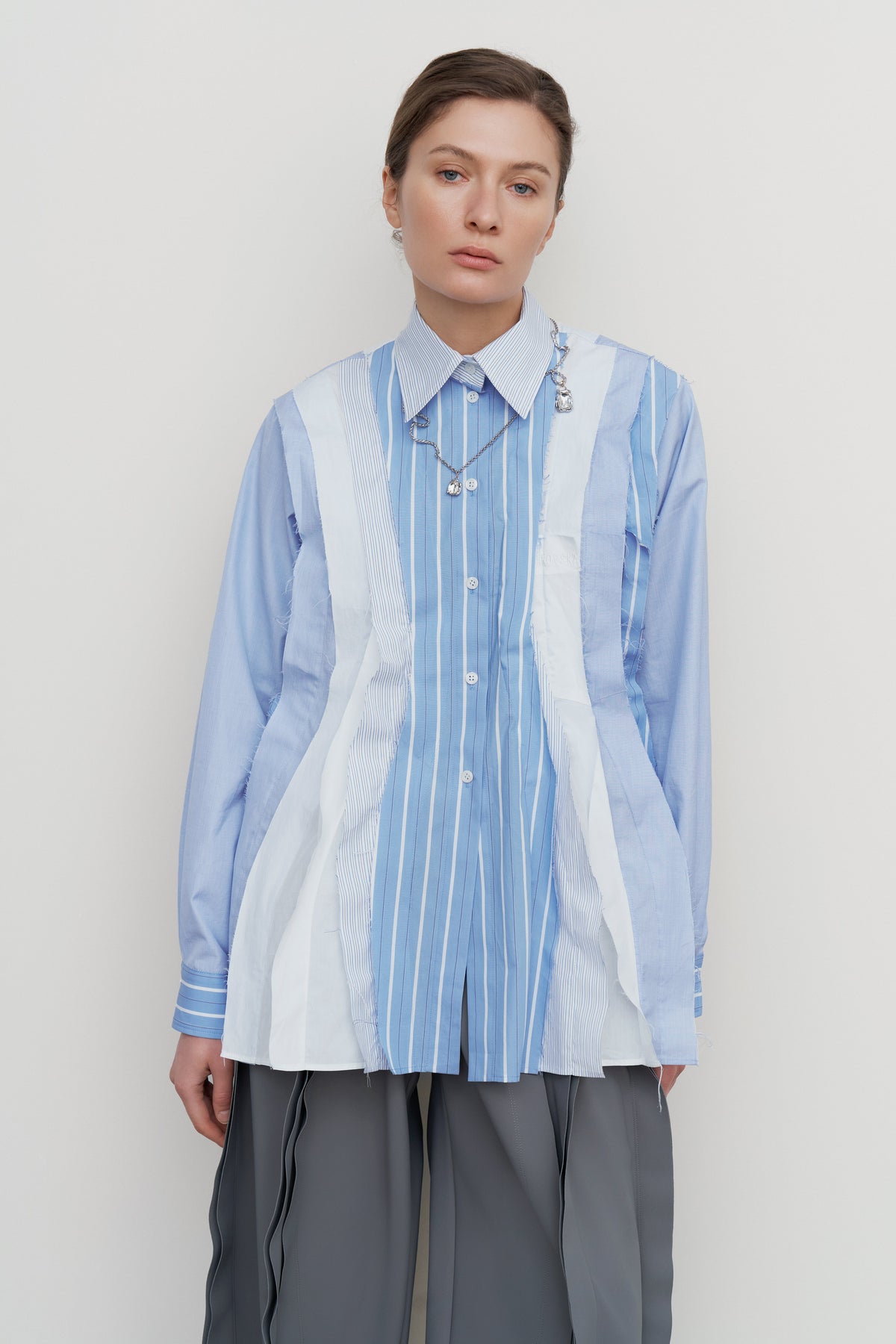 PEPLUM-PLEAT PATCHWORK SHIRT