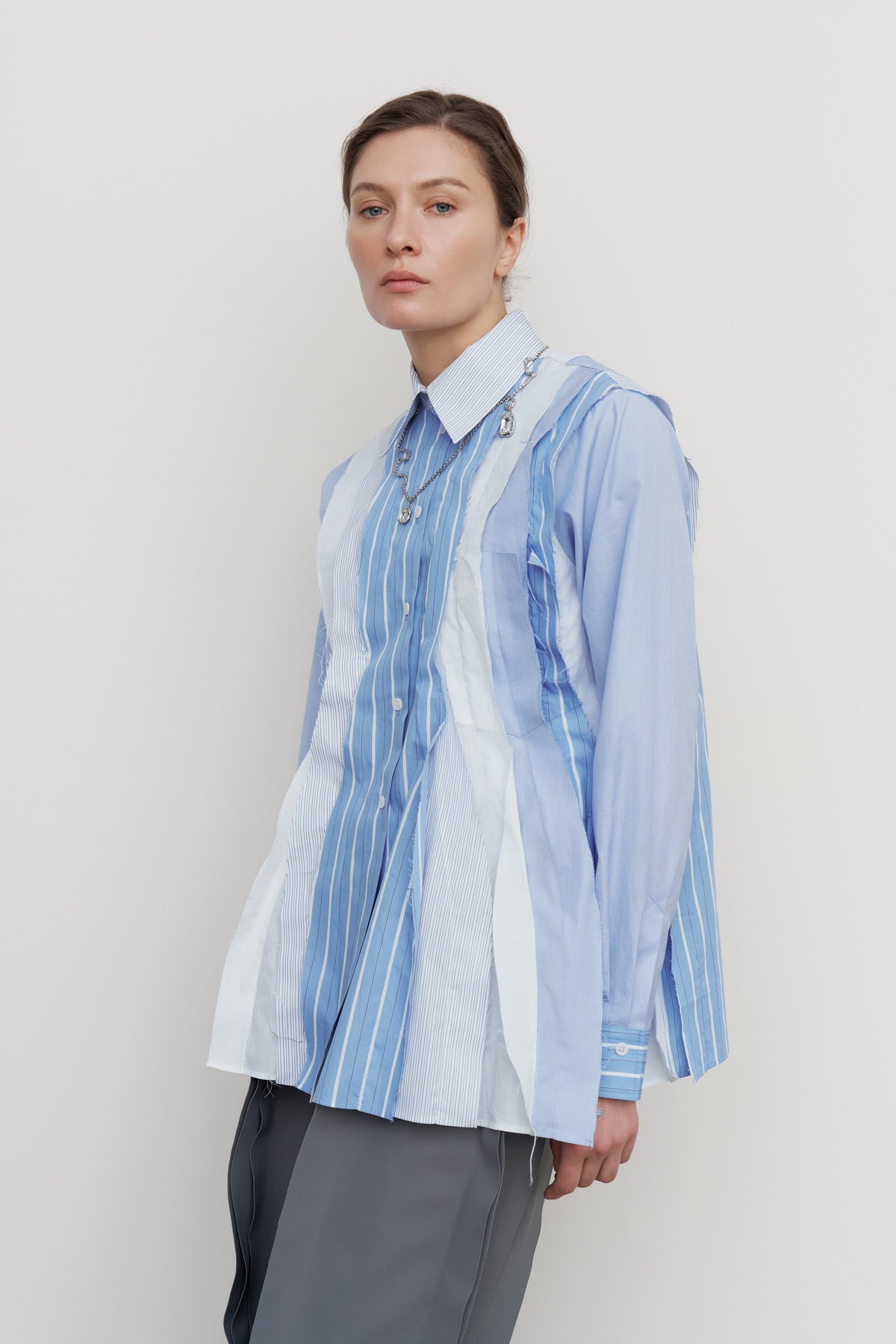PEPLUM-PLEAT PATCHWORK SHIRT