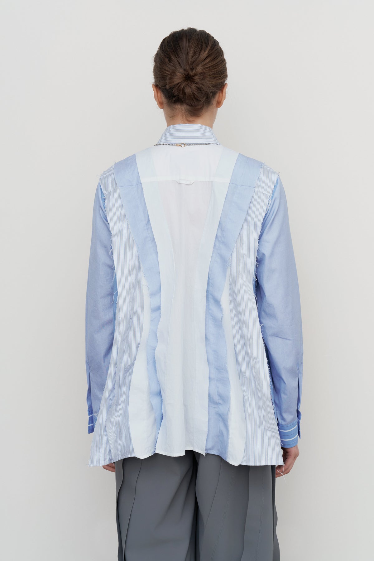 PEPLUM-PLEAT PATCHWORK SHIRT