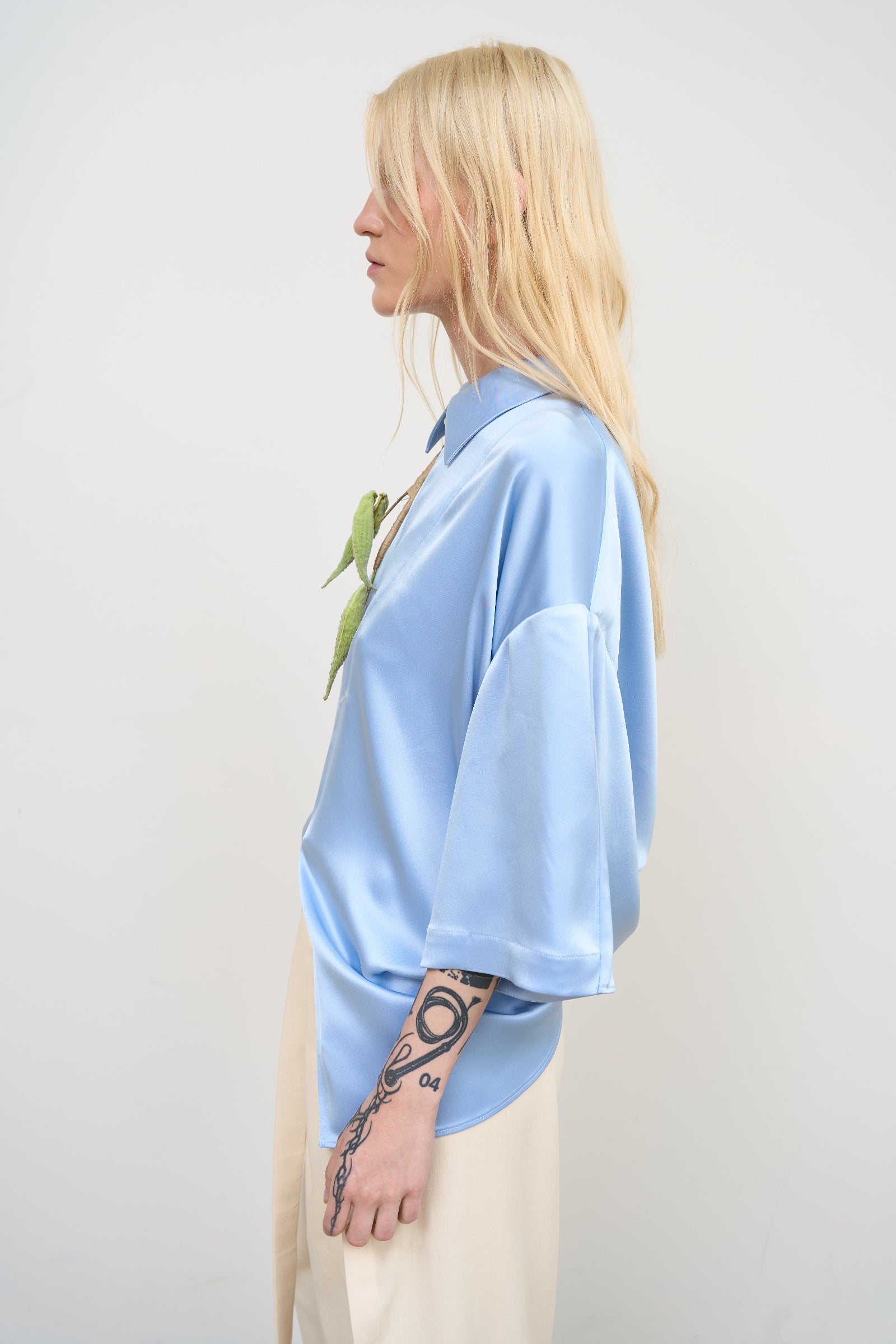 SATIN BLOUSE WITH A TWISTED BACK