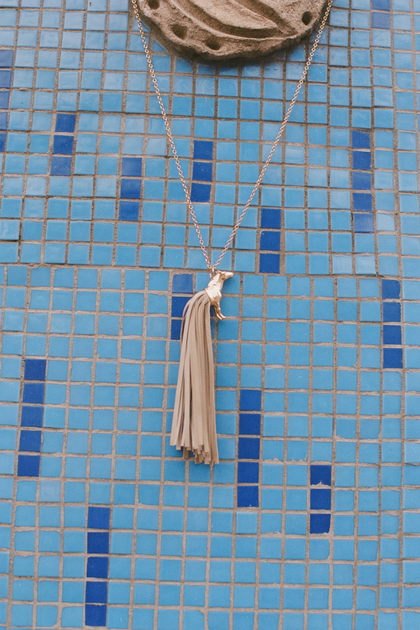 Spirit Gold-Plated Pendant with Ivory Leather-Fringed Tail