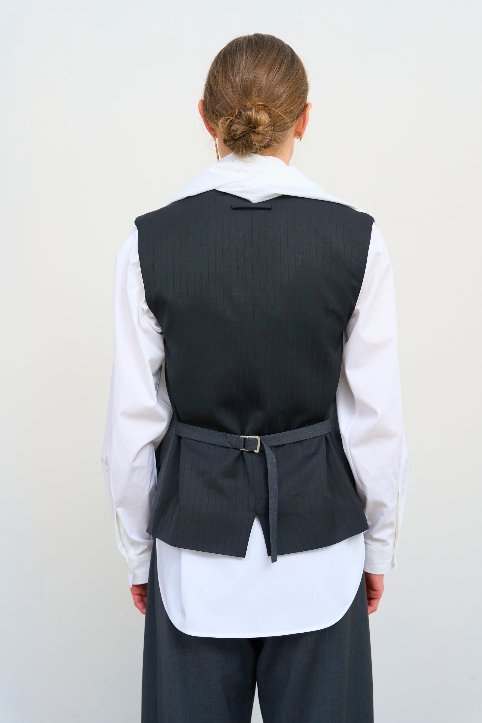 TAILORED VEST WITH FLORAL ACCENTS