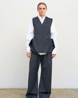 TAILORED VEST WITH FLORAL ACCENTS
