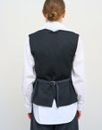 TAILORED VEST WITH FLORAL ACCENTS