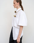 WHITE COTTON SHIRT WITH A TWISTED BACK 2