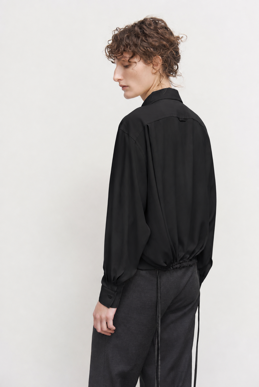 LAYERED BLOUSE WITH TUCKED HEM