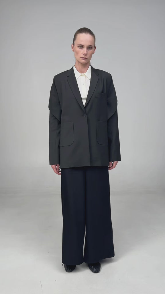 TAILORED JACKET WITH CAPELET OVERLAY IN BLACK