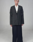 TAILORED JACKET WITH CAPELET OVERLAY IN BLACK